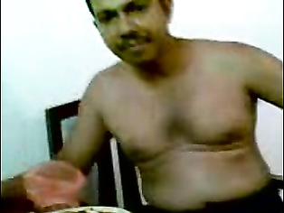 Married Srilankan couple enjoy foreplay session while drinking with their friends.