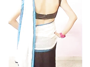 Sexy young indian girl teaching how to wear drapel saree!.
