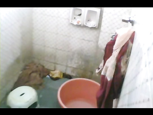 Indian housewife free from her daily household work taking shower on weekend unaware that her man fixed a hidden cam to record her hot shower. video2porn2