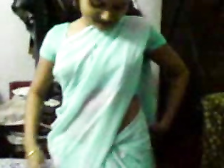 Horny Indian wife in saree striptease at home.