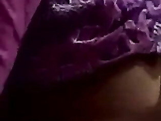 Indian pretty pulling her tits out for lover on cam