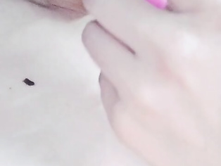 Cute girl playing with her vibrator- oral
