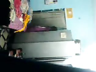 Raghava Telugu aunty changing her clothes in her room.
