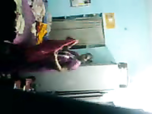 Raghava Telugu aunty changing her clothes in her room.